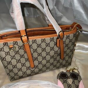 Beige Supreme Canvas Tote with Tan Leather Trim and Gold Hardware